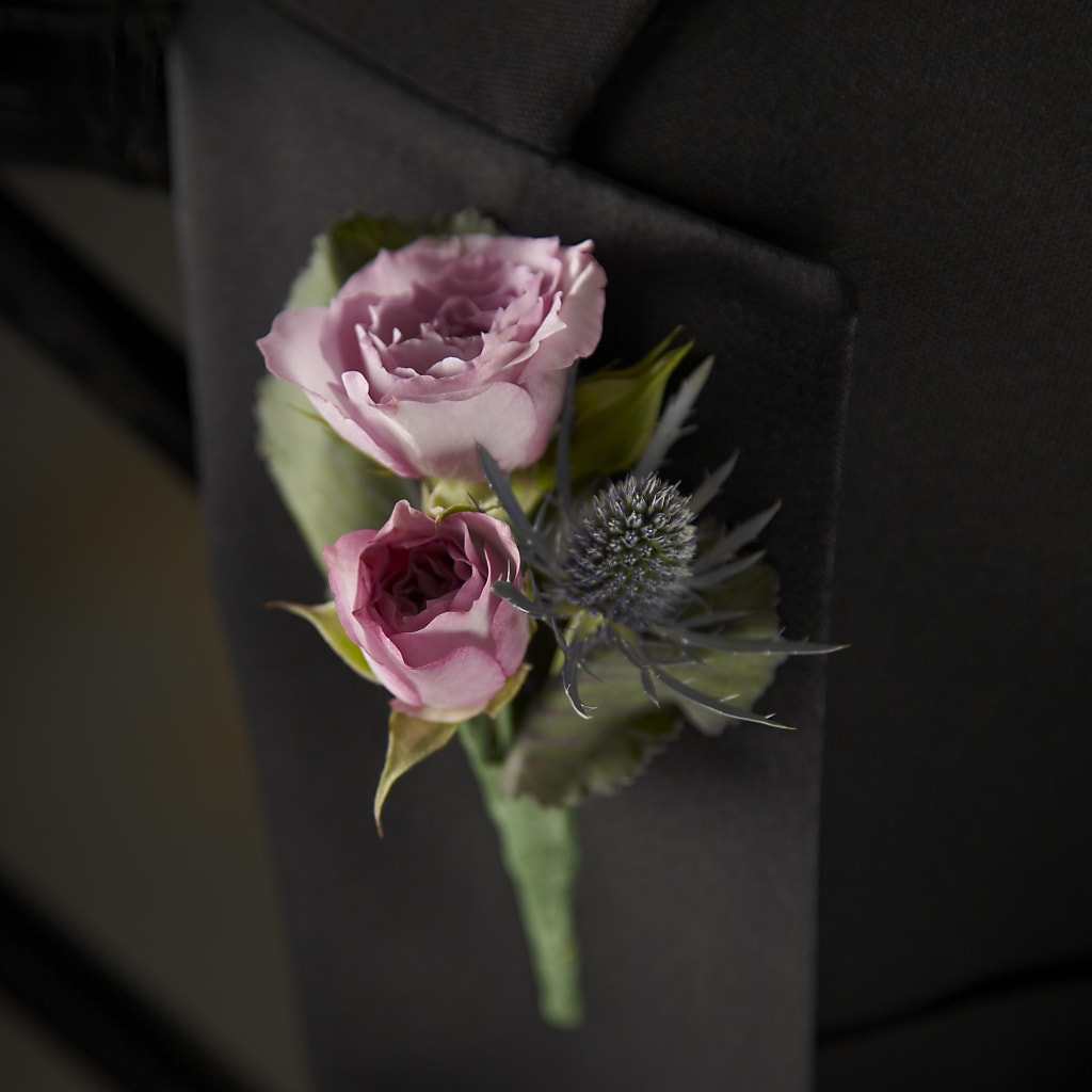 Veronica Boutonniere – Flowers By Design, Midland TX