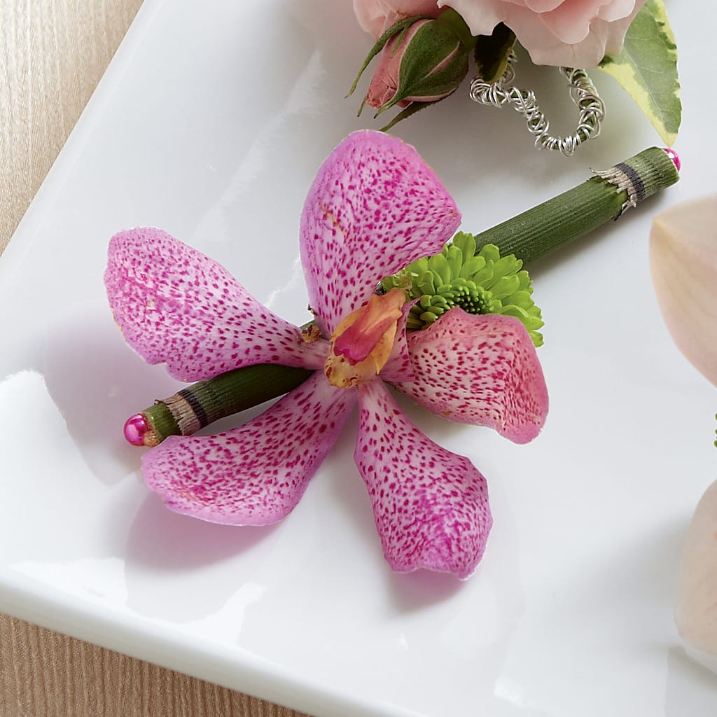 Pink Mokara Boutonniere – Flowers By Design, Midland TX